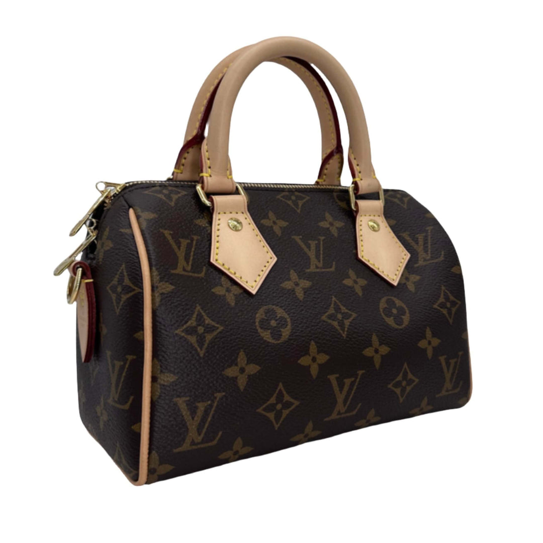 Authentic Louis Vuitton Monogram Speedy Bandouliere 20 front view with tan leather handles and gold hardware.