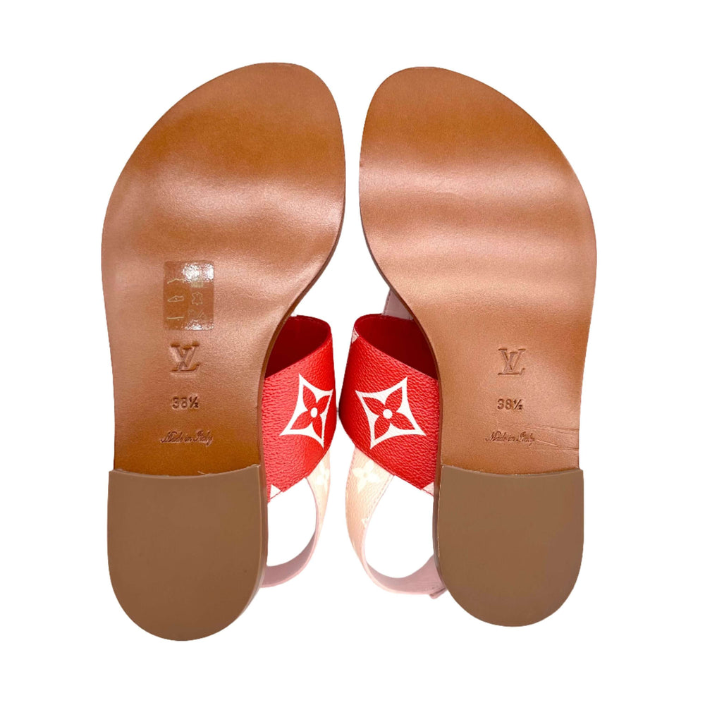 Authentic Louis Vuitton Monogram Giant Sandals 38.5 Rouge with iconic logo design on red straps, showcasing sole details.