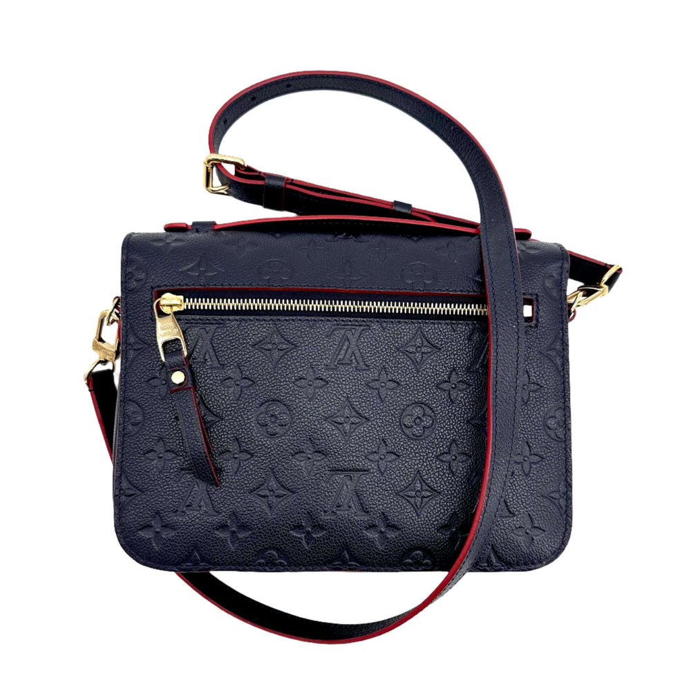 Authentic Louis Vuitton Empreinte Pochette Metis Marine Rouge with gold hardware and embossed monogram design.