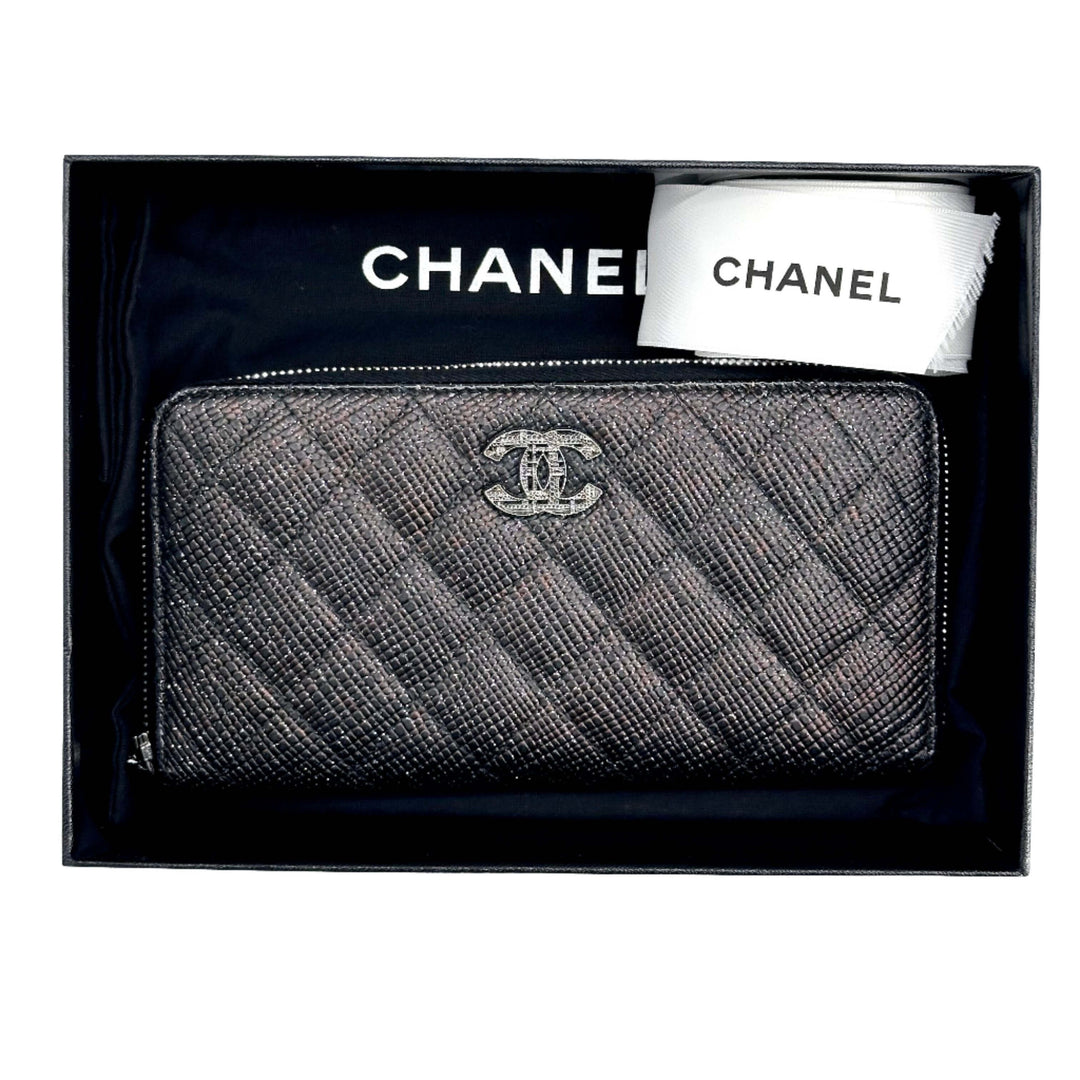 Black CHANEL Glittered Calfskin Quilted Large Gusset Zip Wallet in luxurious box with logo detailing.