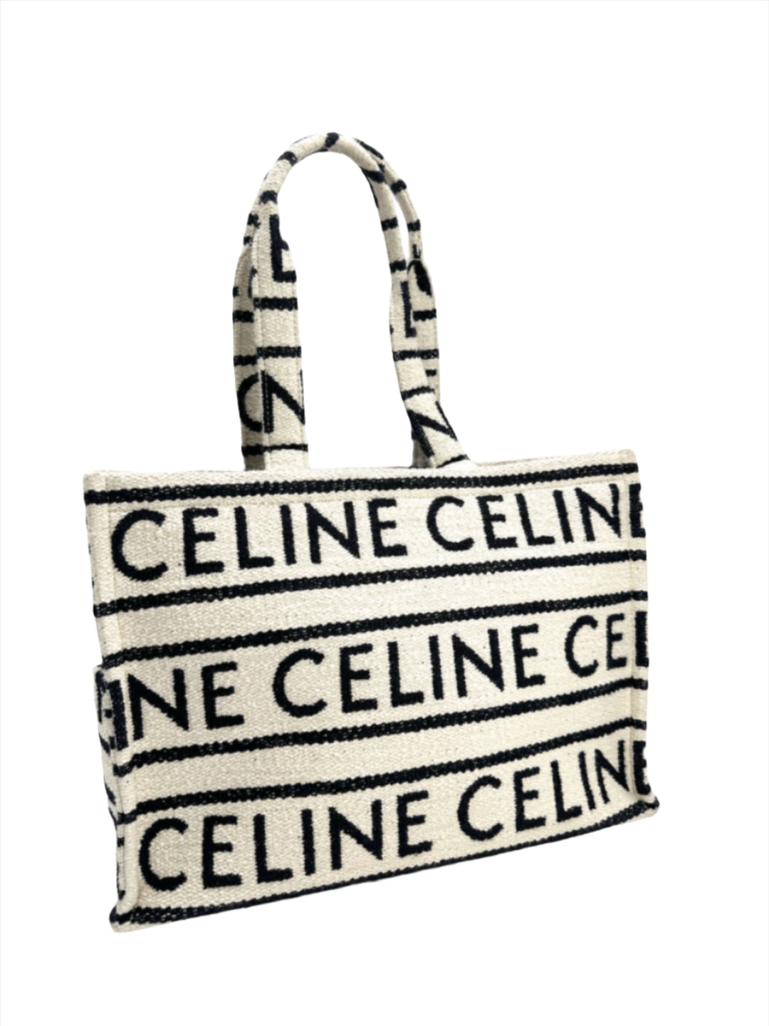 CELINE Canvas Large All Over Cabas Thais tote bag with black logo print on white canvas background.