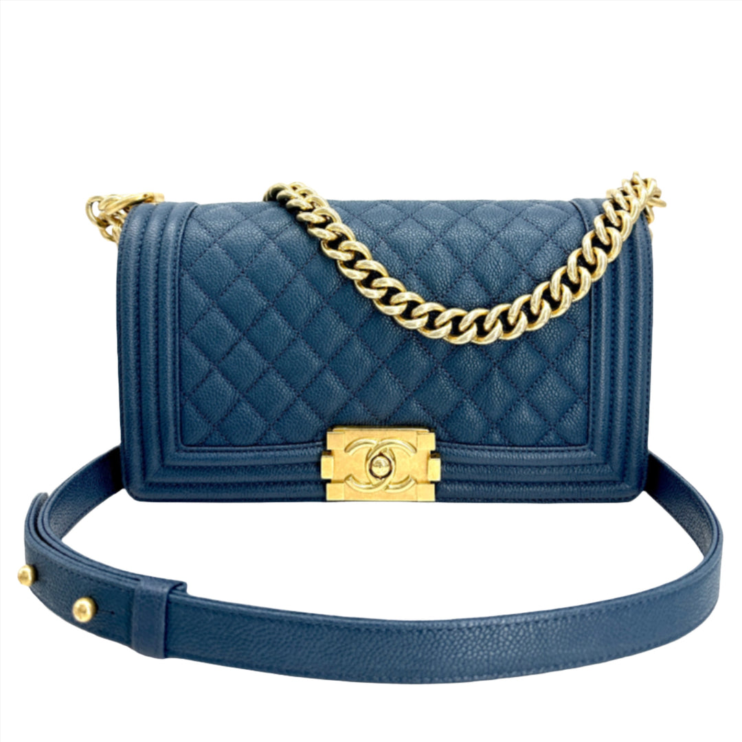 Authentic CHANEL Caviar Quilted Medium Boy Flap in Blue with gold chain strap