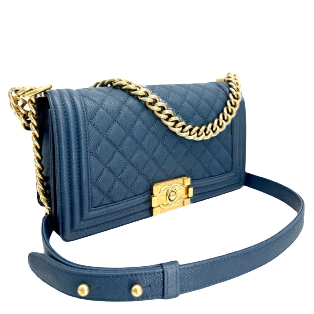 Authentic CHANEL Caviar Quilted Medium Boy Flap in Blue with gold chain and clasp