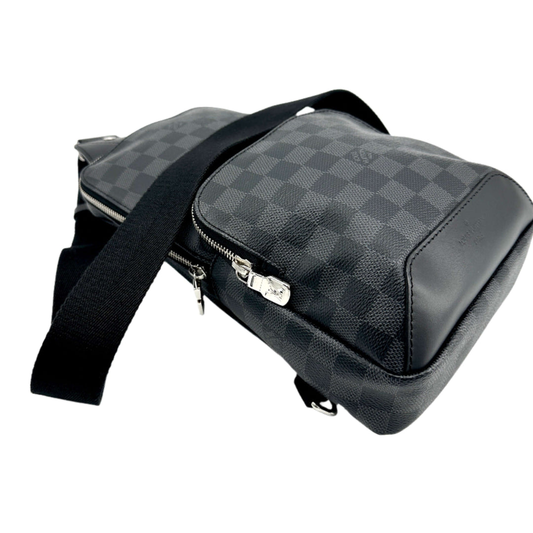 LOUIS VUITTON Damier Graphite Avenue Sling Backpack with black adjustable strap and silver zipper