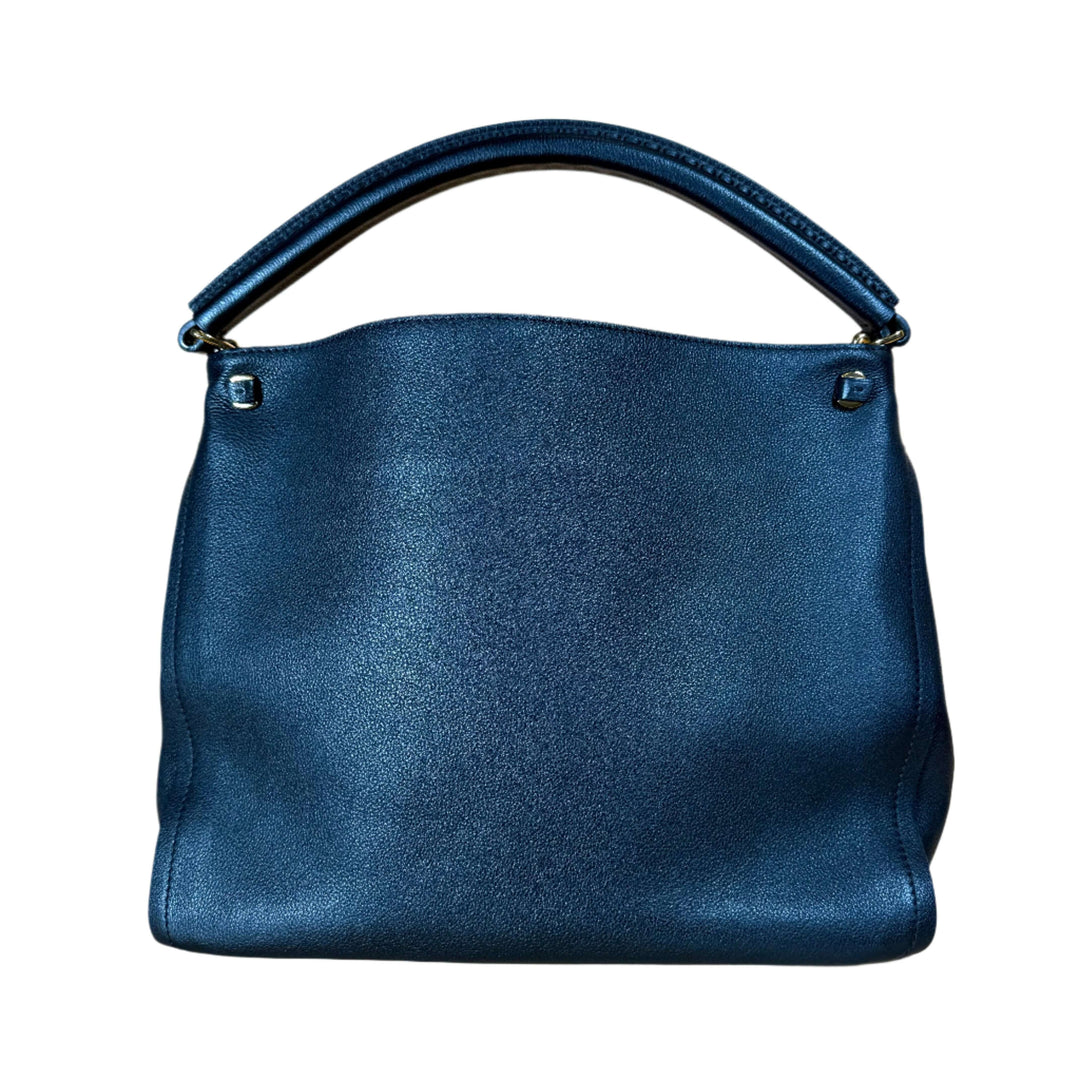 Authentic Louis Vuitton Calfskin Tournon bag in deep navy, showcasing smooth leather and elegant brass hardware details.