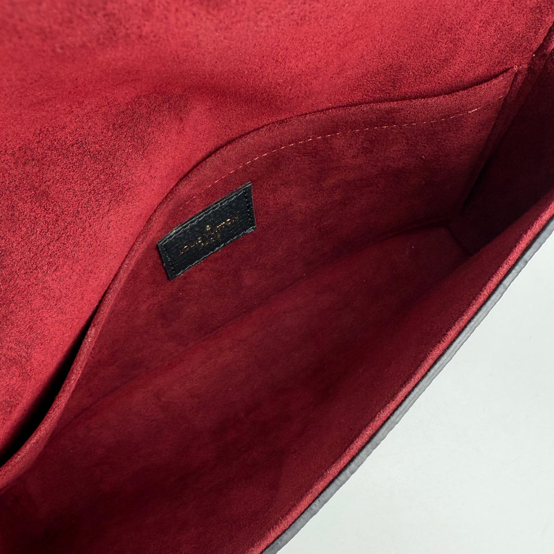 Interior view of the Authentic Louis Vuitton Felicie Pochette, showcasing deep burgundy lining and label detail.