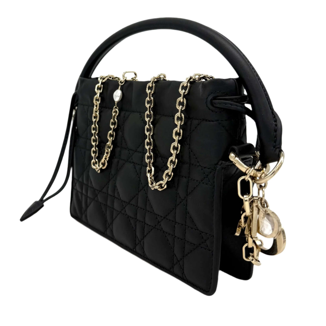 Authentic Christian Dior black lambskin mini top handle bag with gold chain detailing and iconic D.I.O.R. charm.