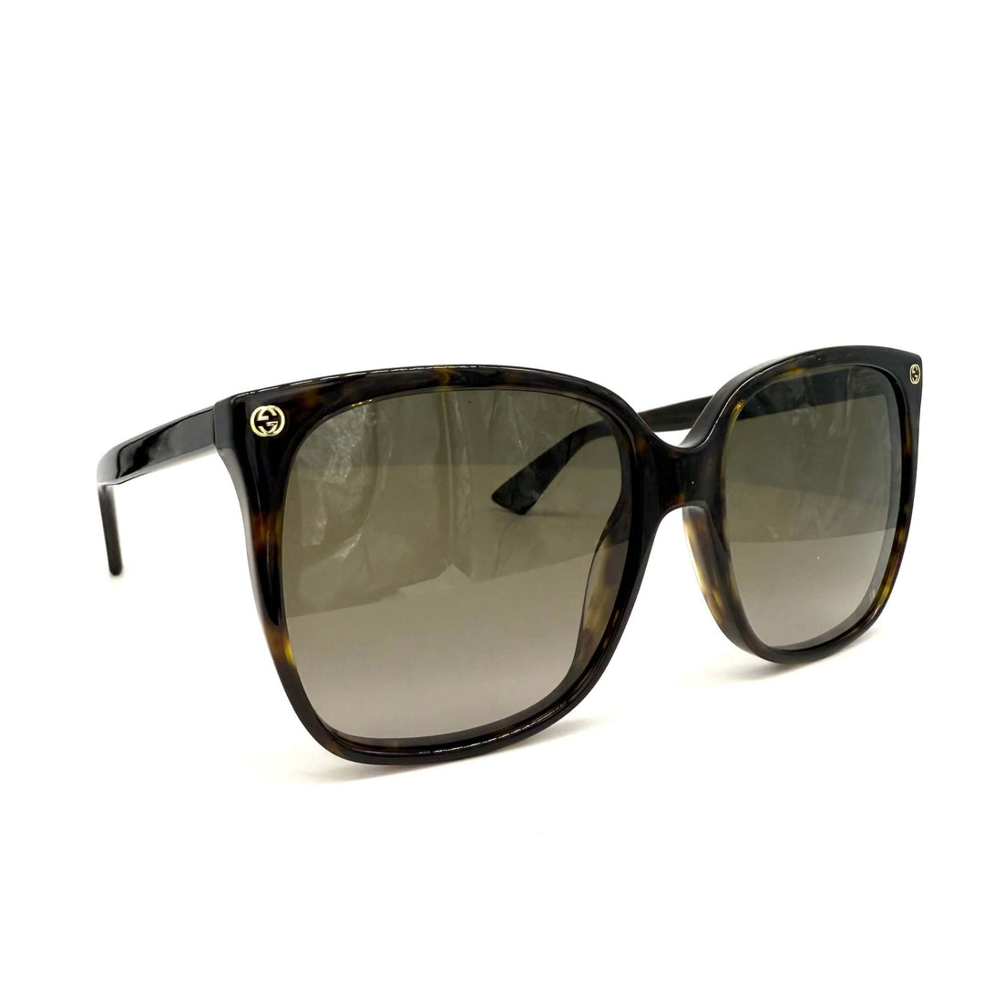 Authentic Gucci GG0022S cat eye sunglasses in havana with brown lenses, showcasing elegant design and modern style.