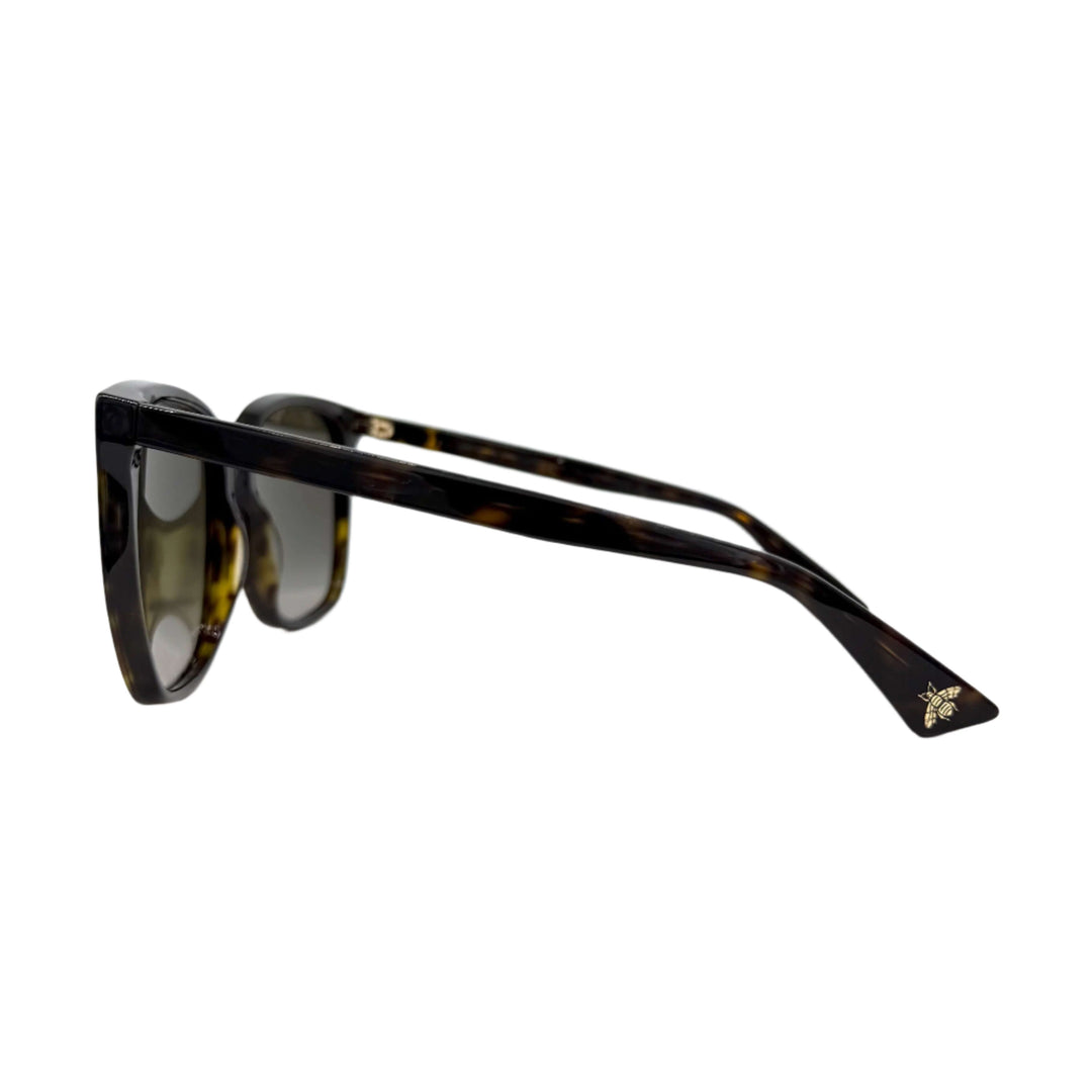 Side view of Authentic Gucci GG0022S Cat Eye Sunglasses in Havana with brown lenses, showcasing stylish design and detailed frame.