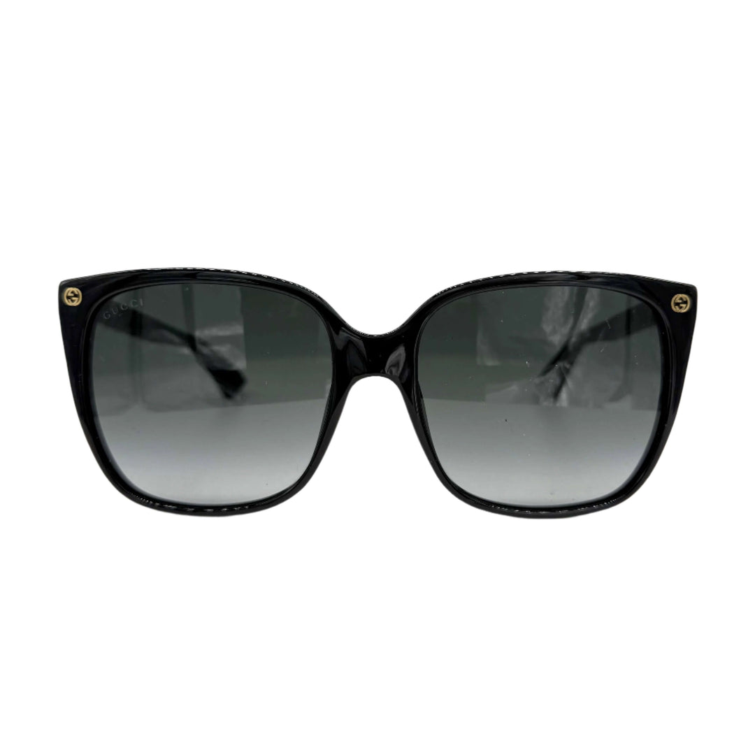 Authentic Gucci GG0022S Cat Eye Sunglasses in black with grey lenses, showcasing elegant design and modern style.