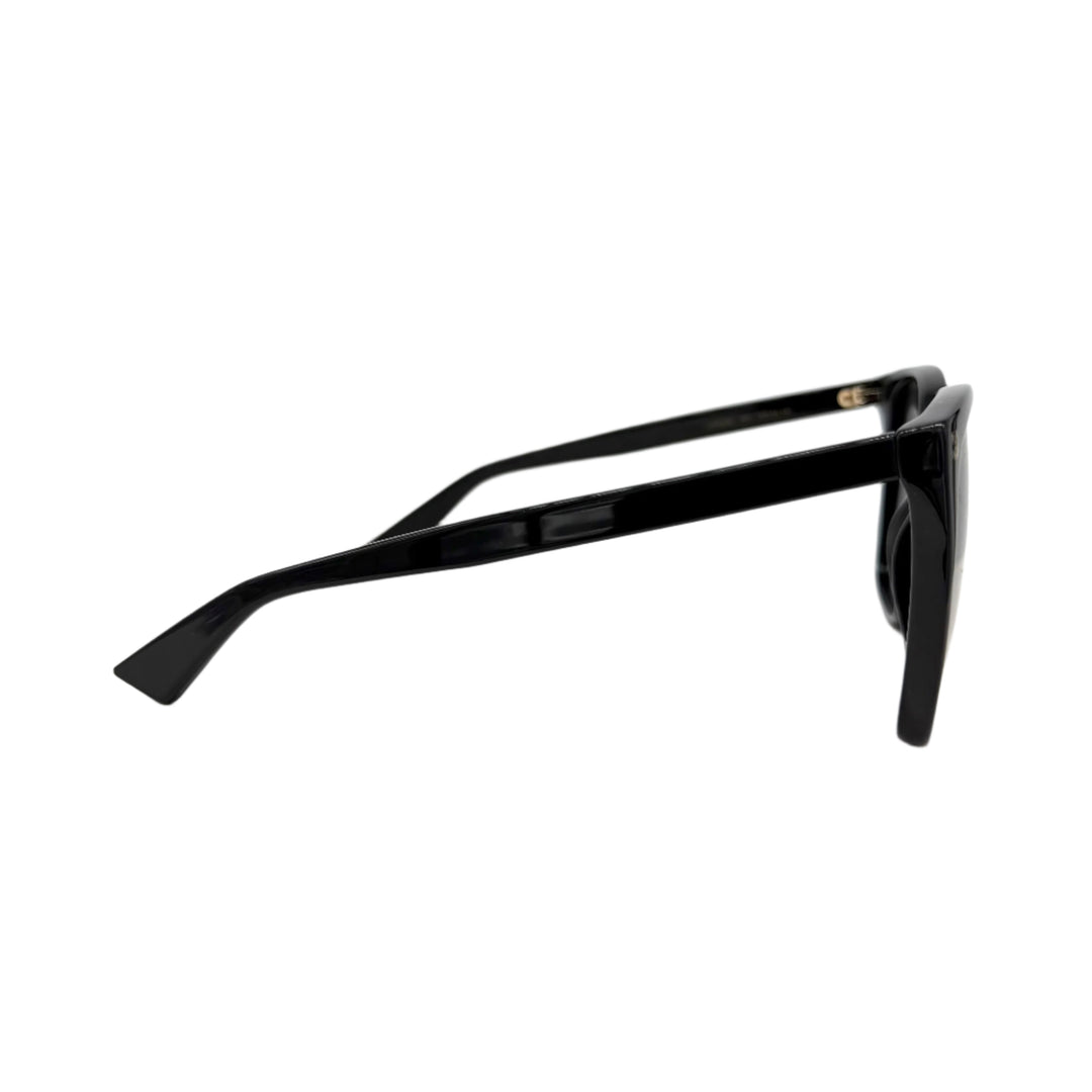 Side view of Authentic Gucci GG0022S Cat Eye Sunglasses in black, showcasing their sleek design and fashionable frame.