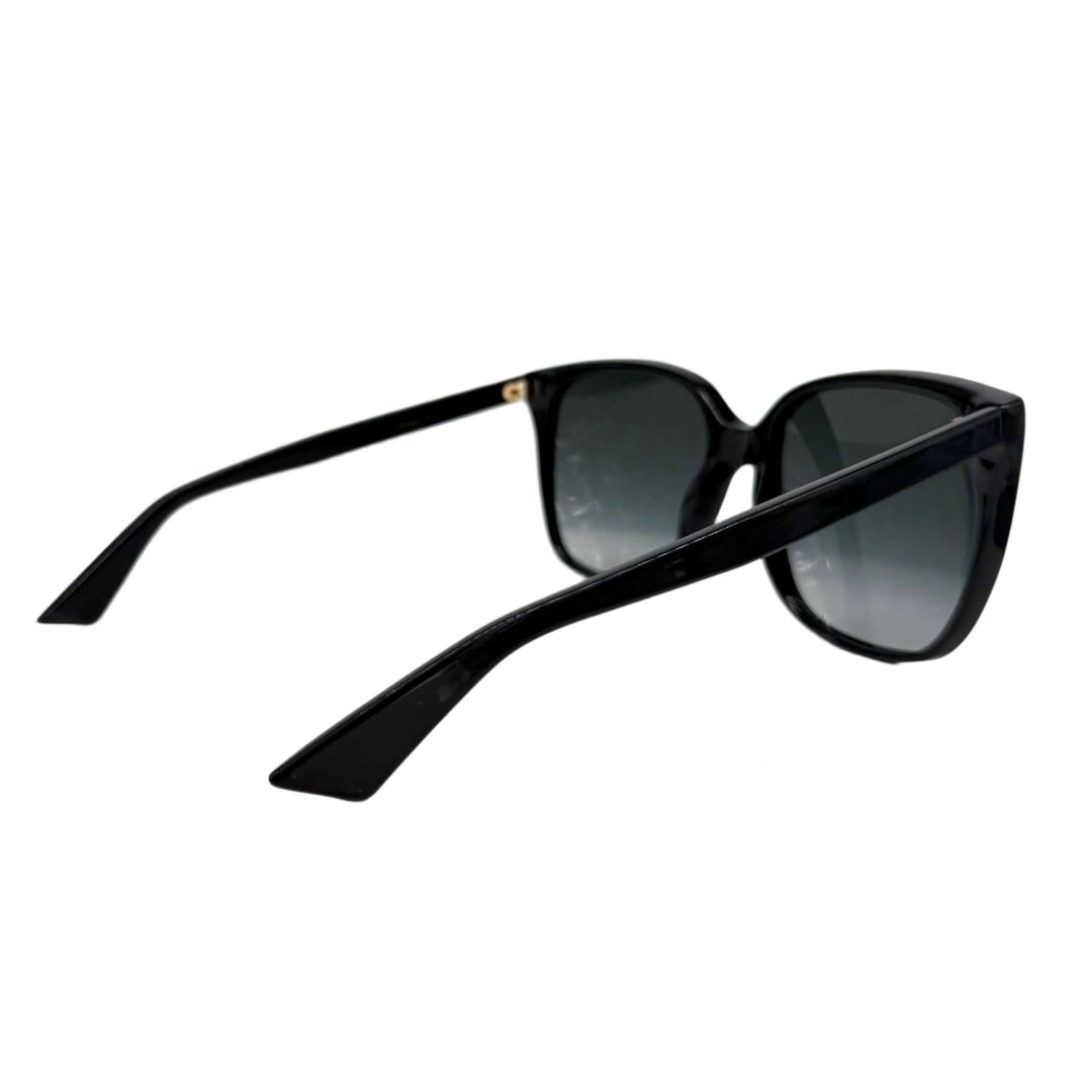 Authentic Gucci GG0022S cat eye sunglasses in black with grey lenses, showcasing elegant and stylish design.