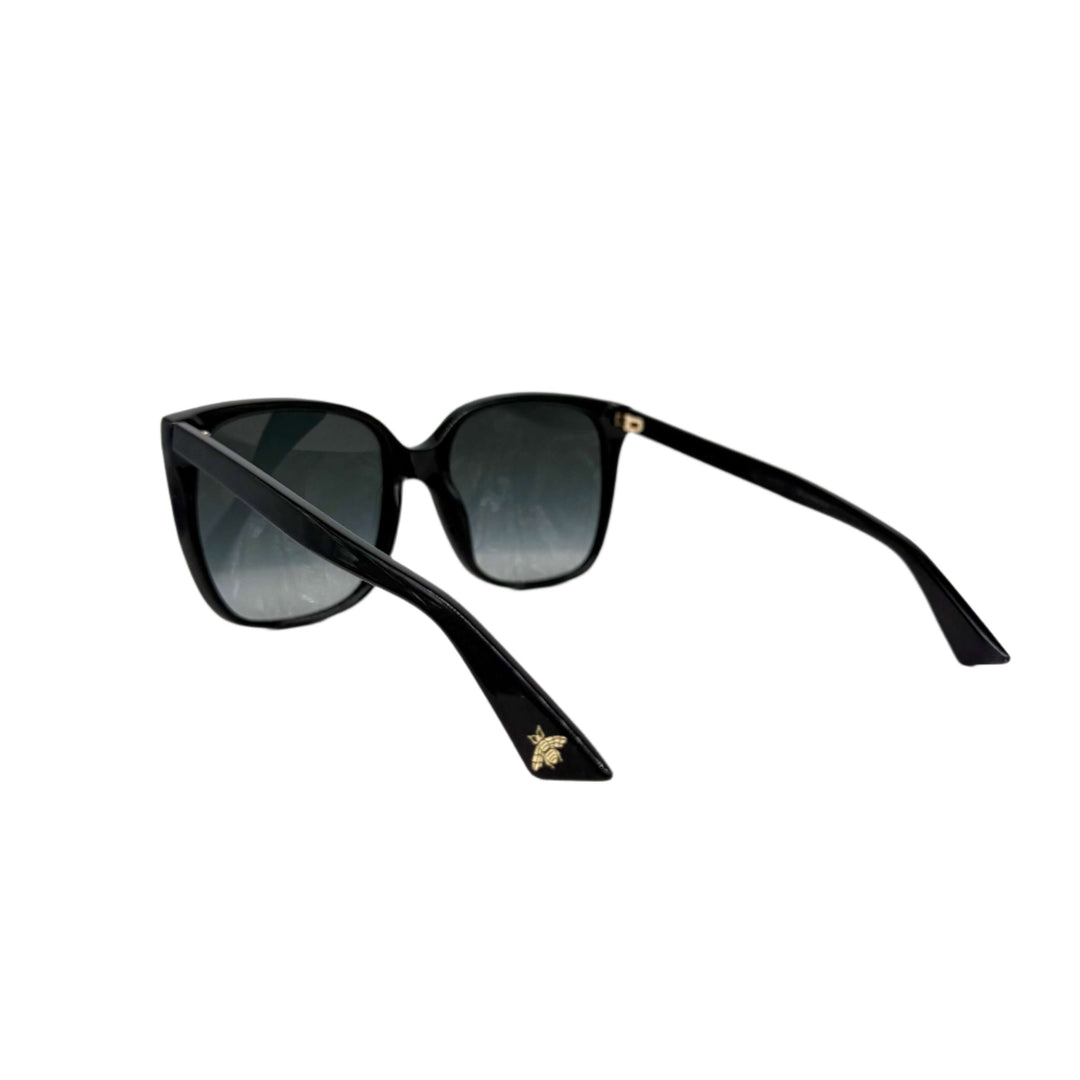 Authentic Gucci GG0022S Cat Eye Sunglasses in black with grey lenses showcasing stylish design and comfort.