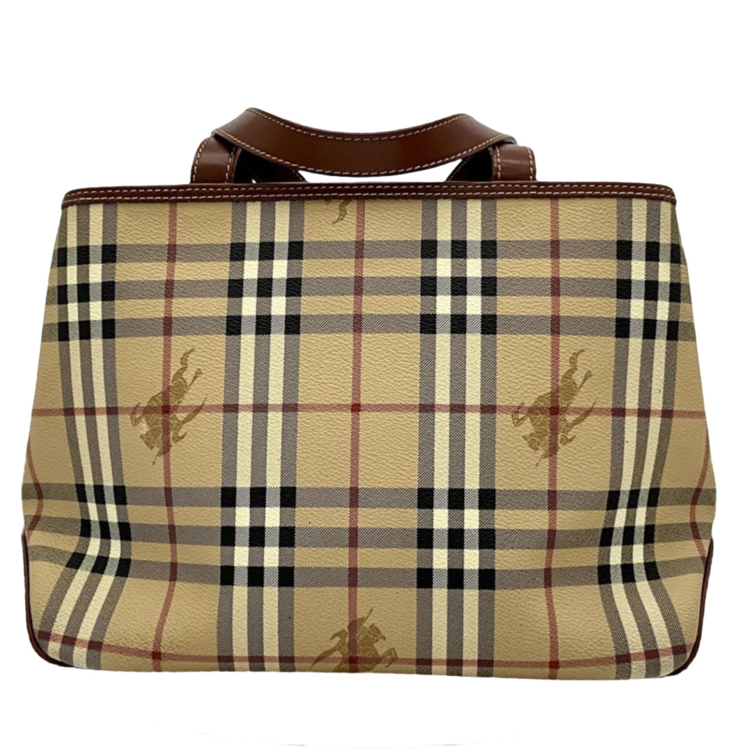 Vintage Burberry shoulder bag with classic check pattern and leather handles.