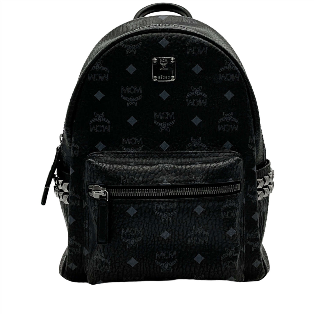 MCM Stark Side Studs Backpack in Visetos with black leather, front pocket, and silver studs detailing.
