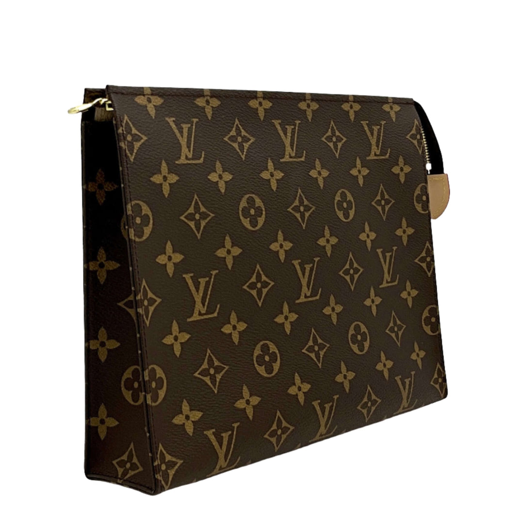 LOUIS VUITTON Monogram Toiletry Pouch 26 in brown canvas with iconic monogram pattern, side view showing versatile and timeless design