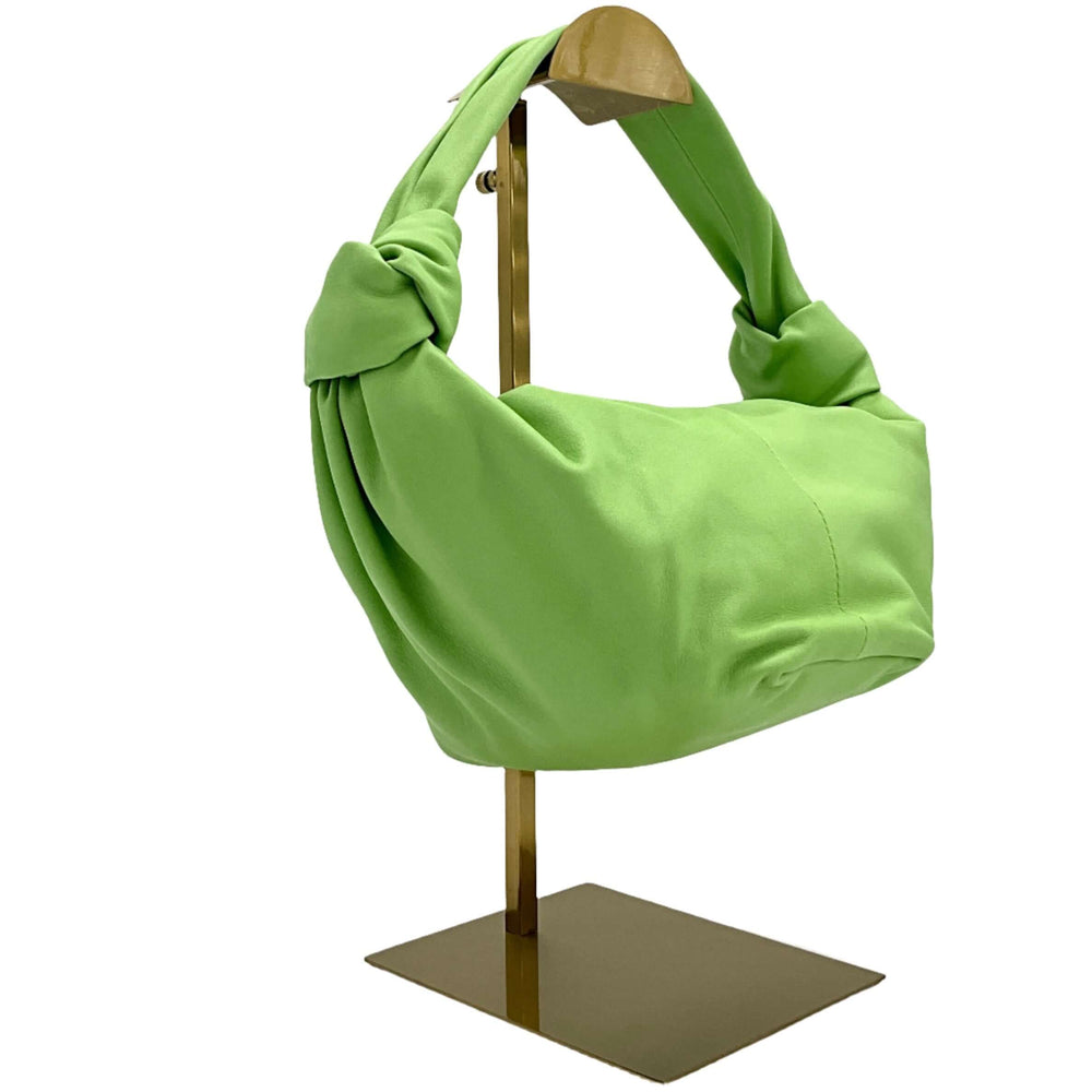 Bottega Veneta Nappa Mini Double Knot Bag in green on display stand