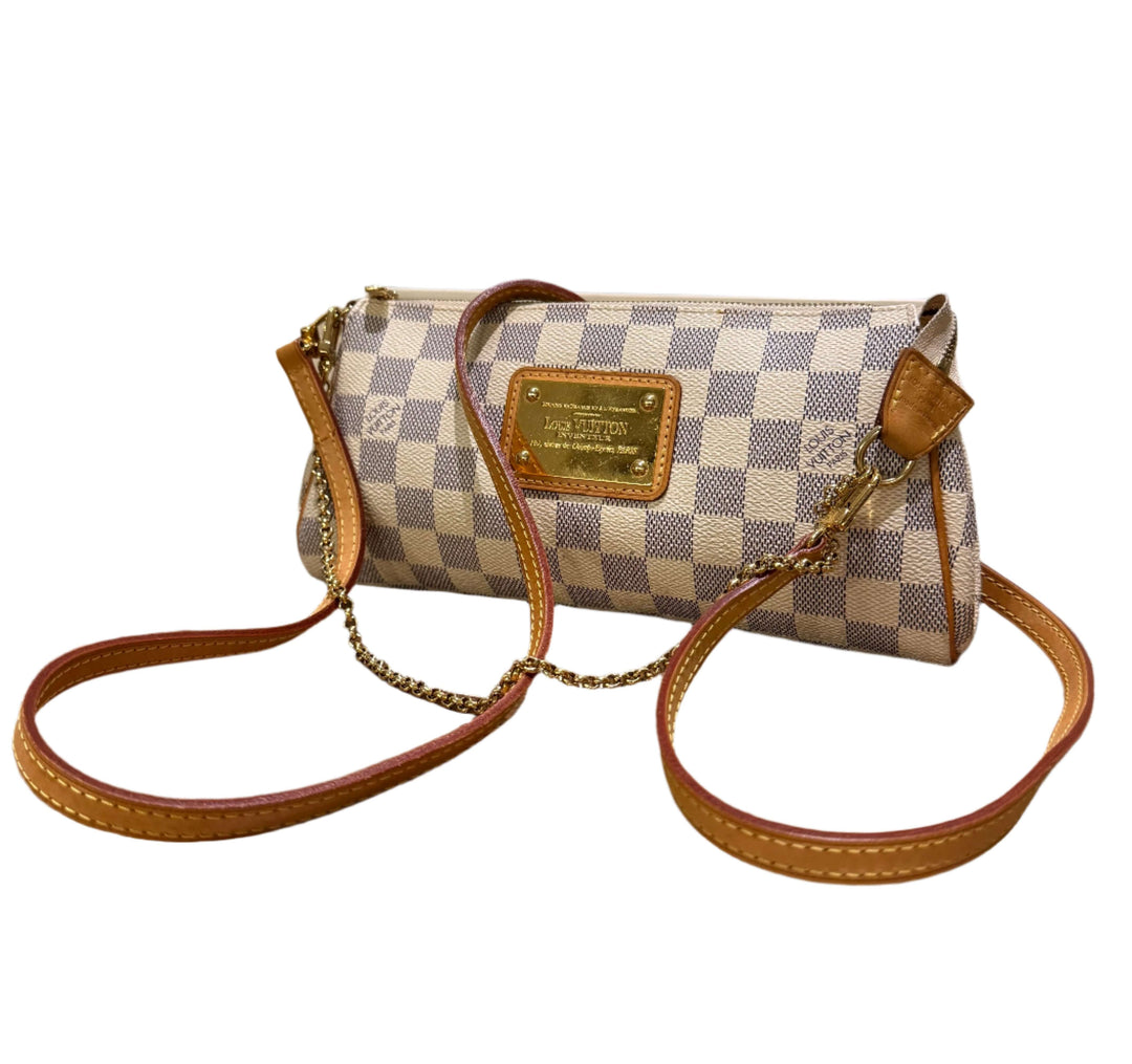 Authentic Louis Vuitton Damier Azur Eva Clutch with natural leather trim and chain strap, showcasing refined elegance.