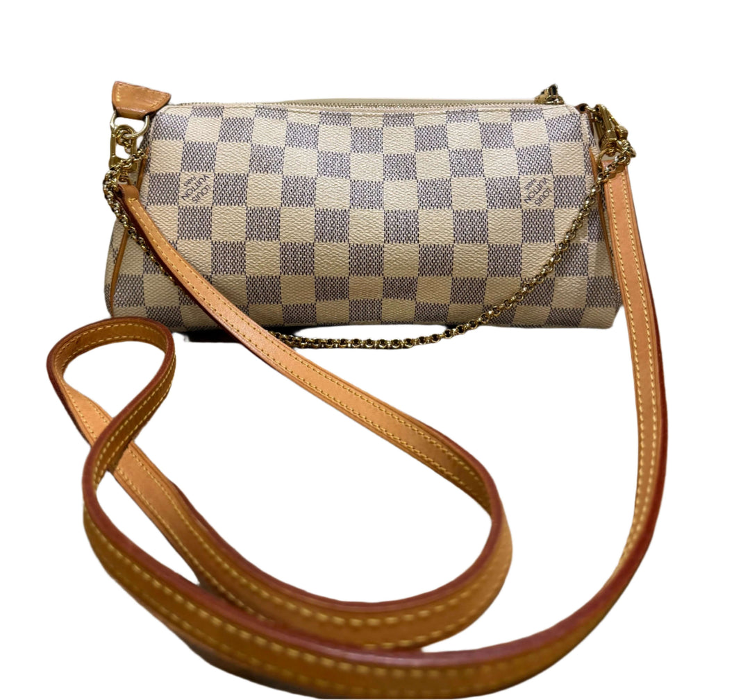 Authentic Louis Vuitton Damier Azur Eva Clutch with natural leather trim and chain strap, showcasing elegant design.