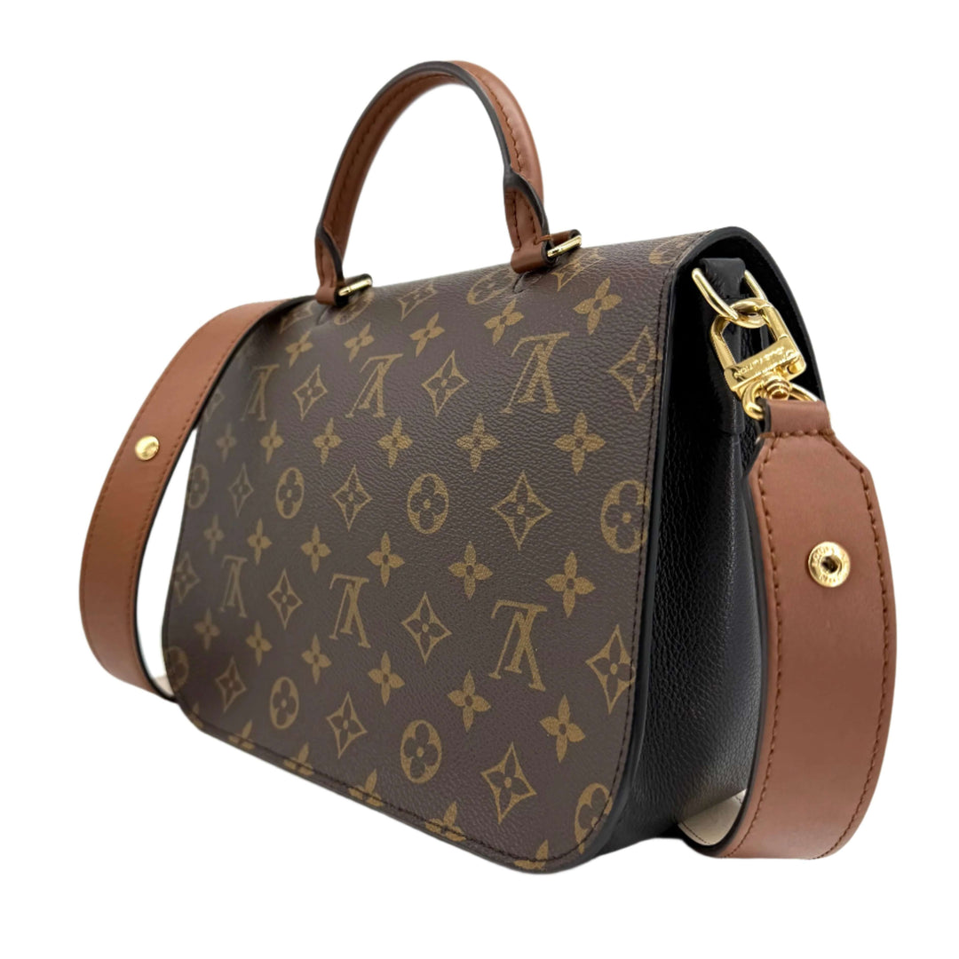 Authentic Louis Vuitton Monogram Vaugirard bag in black with brown accents, showcasing elegant design and craftsmanship.