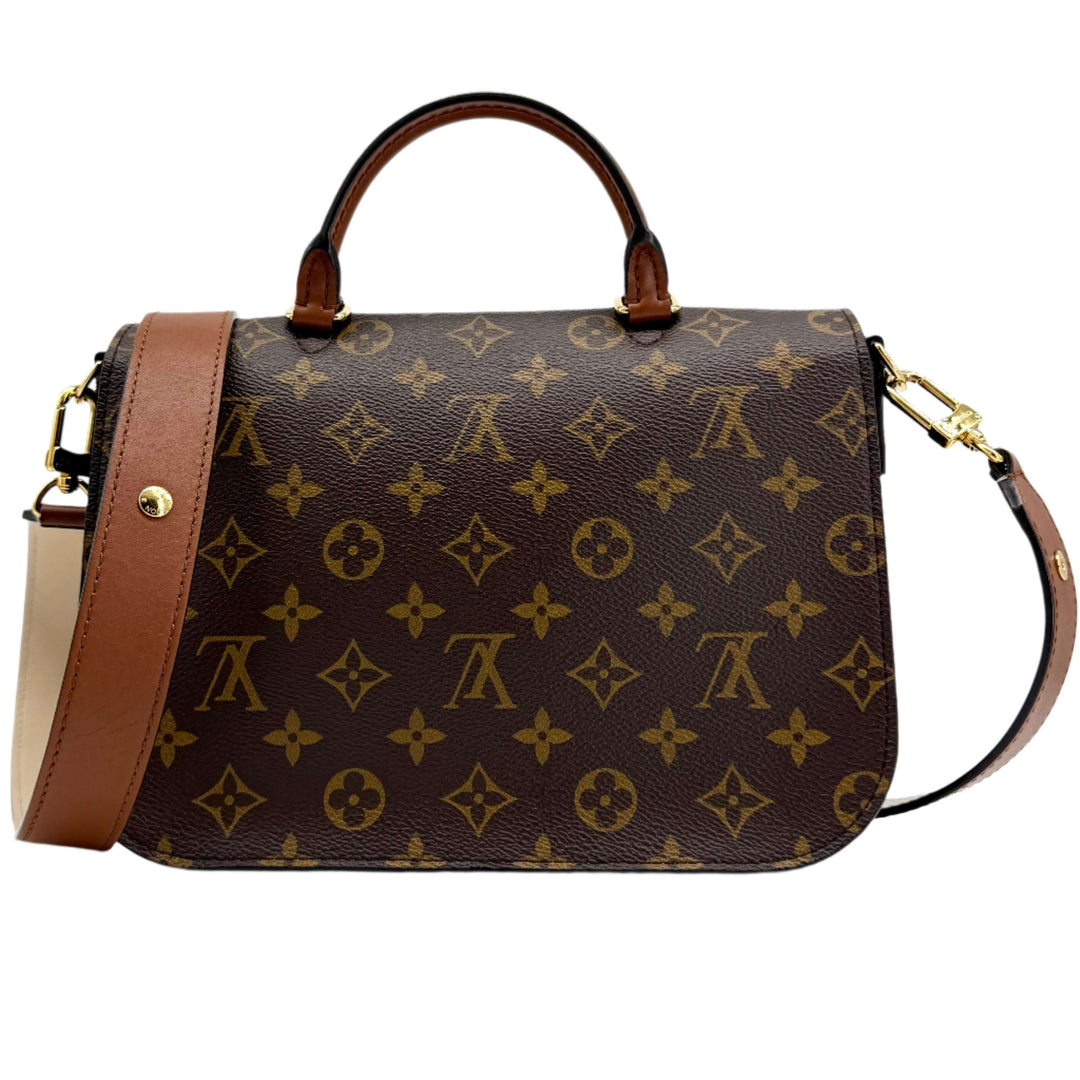 Authentic Louis Vuitton Monogram Vaugirard bag in black with brown accents showcasing timeless elegance and sophisticated design.