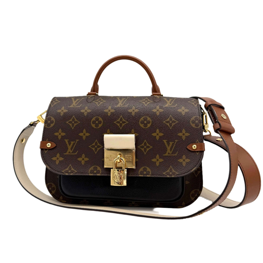 Authentic Louis Vuitton Monogram Vaugirard in Black with gold lock and leather trim, showcasing timeless elegance and modern design.