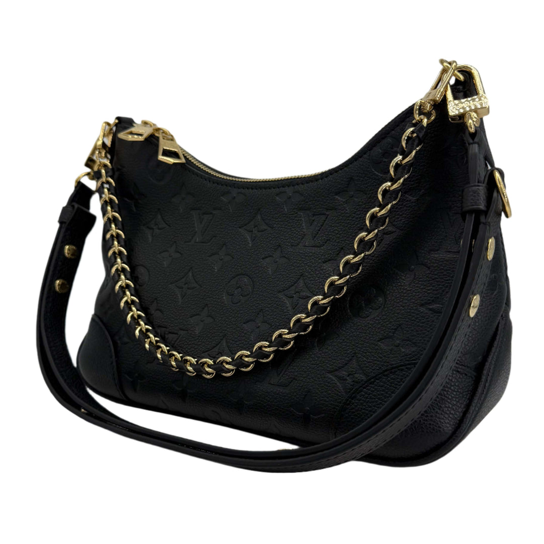 Louis Vuitton Boulogne Bag in black Monogram Empreinte leather, featuring gold hardware and chain strap.