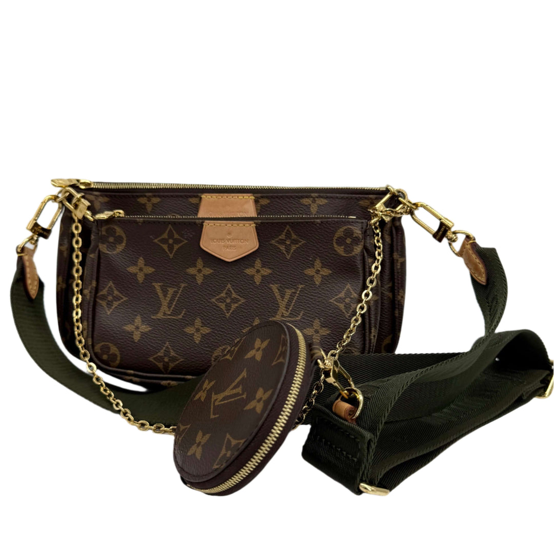 Authentic Louis Vuitton Monogram Multi Pochette Accessoires in Khaki with adjustable strap and compartments.