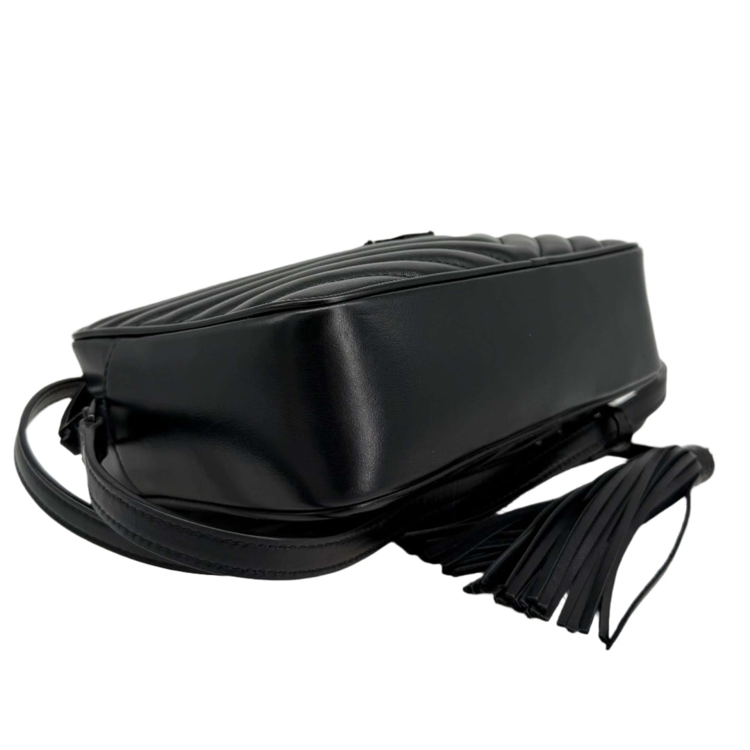 Black calfskin matelassé monogram camera bag with quilted design and fringe detail.