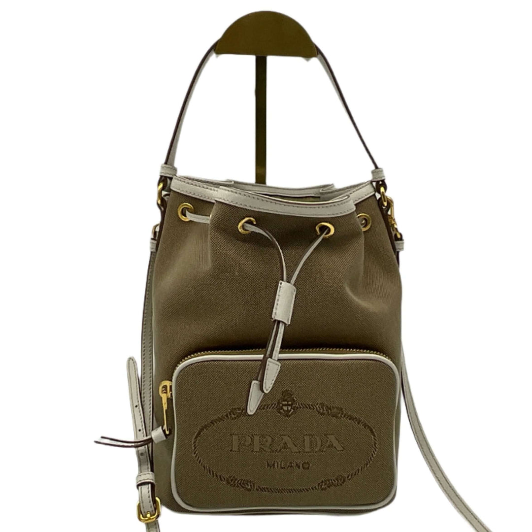 PRADA Jacquard Logo Mini Bucket Crossbody Bag in Beige Canvas and Leather with Corda Talco accents.