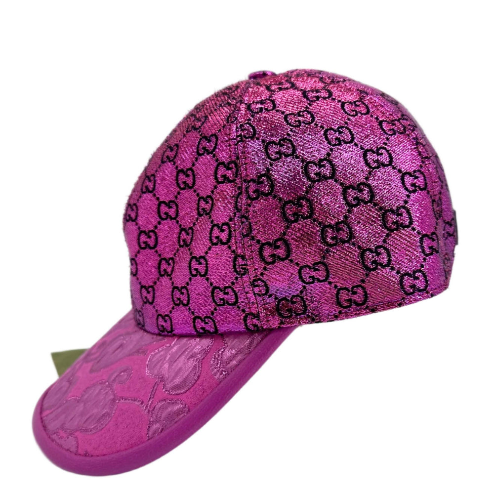 Authentic GUCCI magenta GG monogram cap - iconic designer accessory in vibrant pink shade with signature pattern.