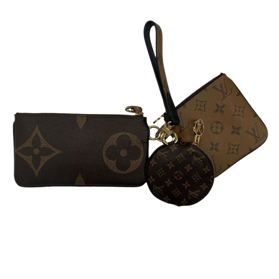 Authentic Louis Vuitton Reverse Monogram Giant Trio Pouch