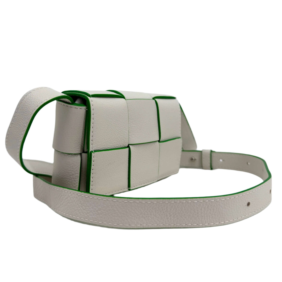 Bottega Veneta Buffalo Maxi Intrecciato Extra Mini Cassette Crossbody in white and parakeet green.