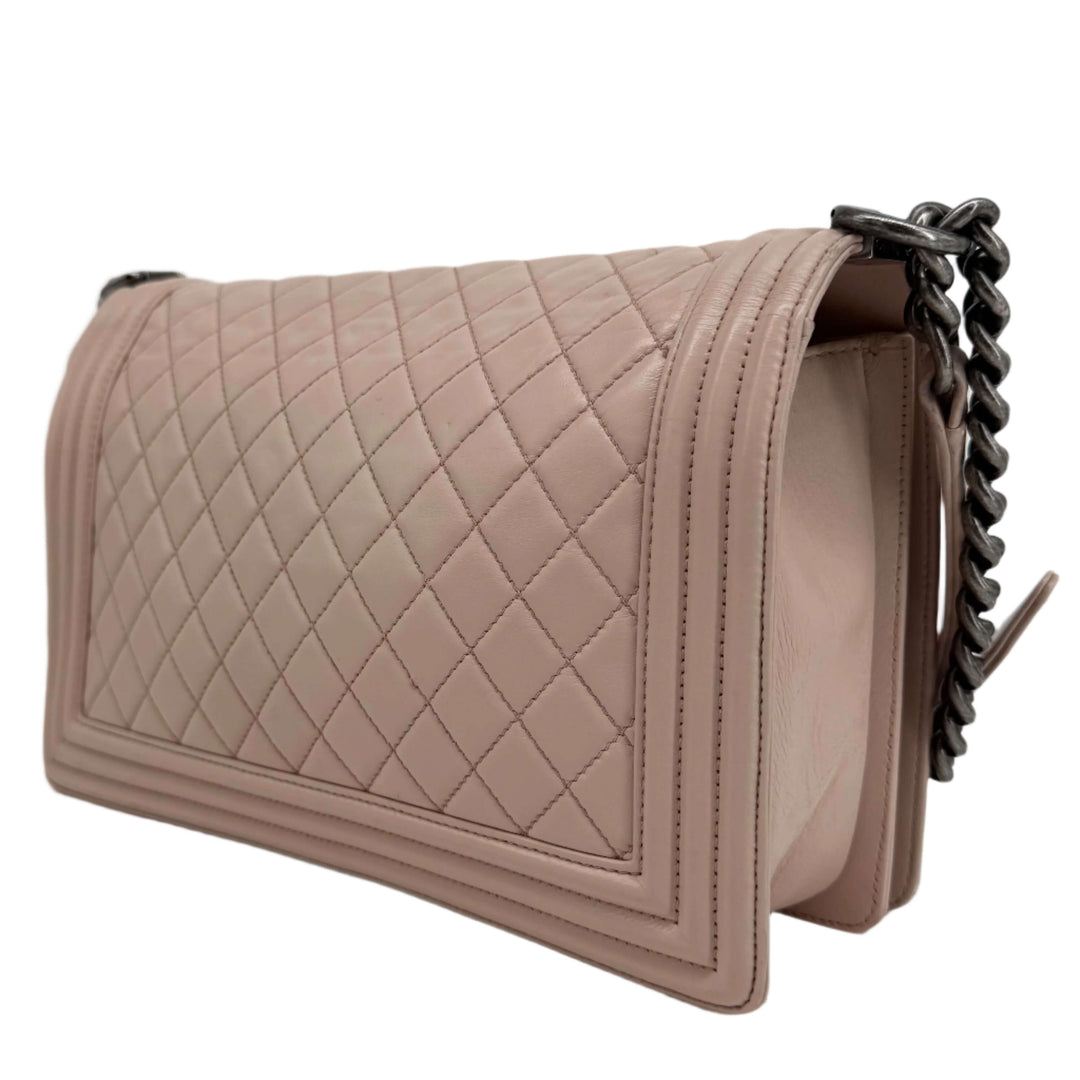 Chanel Lambskin Quilted Medium Boy Flap in Light Pink with diamond quilt pattern and ruthenium hardware.