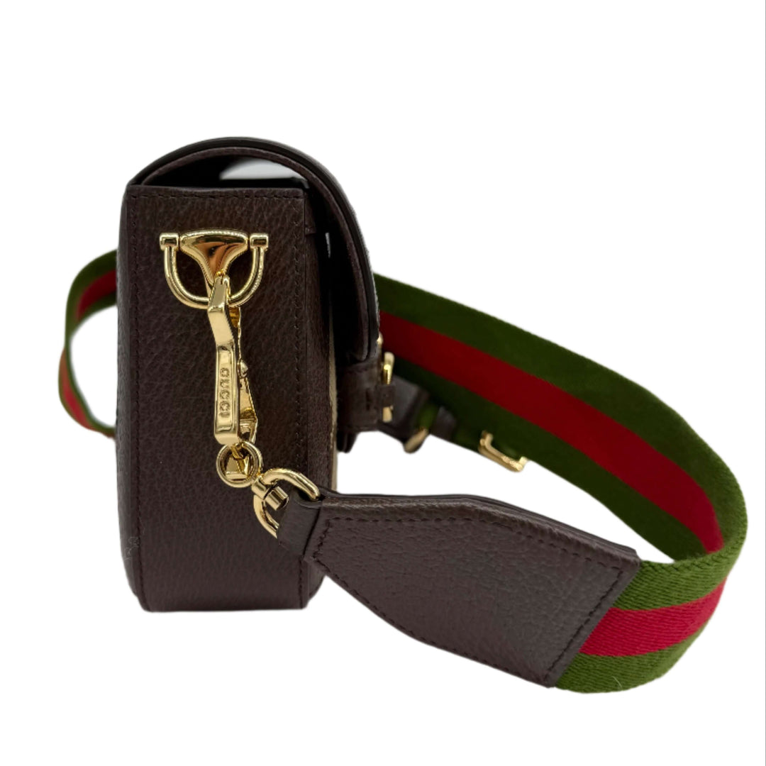 Gucci Monogram Jumbo GG Web Mini Horsebit 1955 Shoulder Bag side view with green and red strap