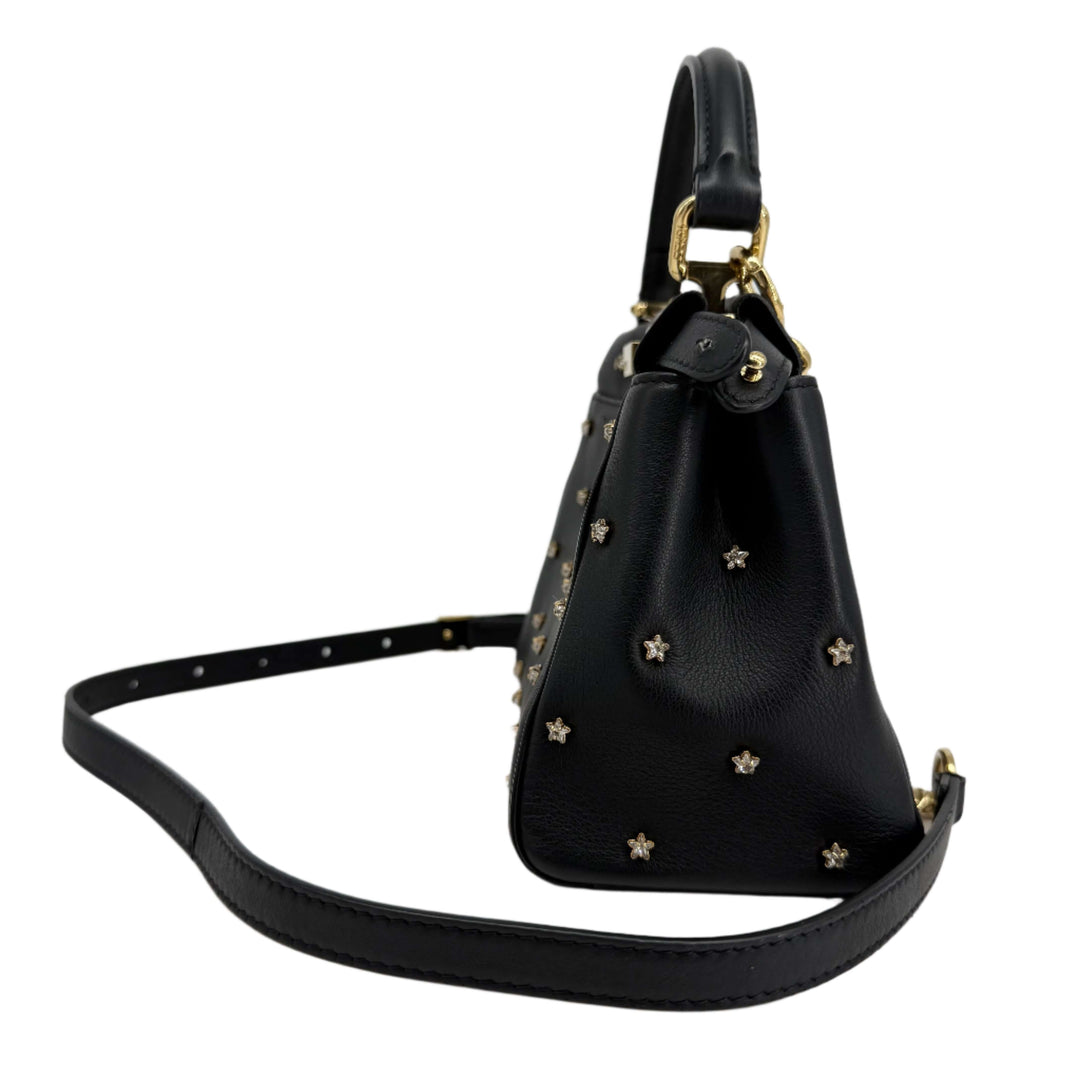 Side view of Fendi Nappa Crystal Studded XS Peekaboo Iconic Satchel in Black with star embellishments.