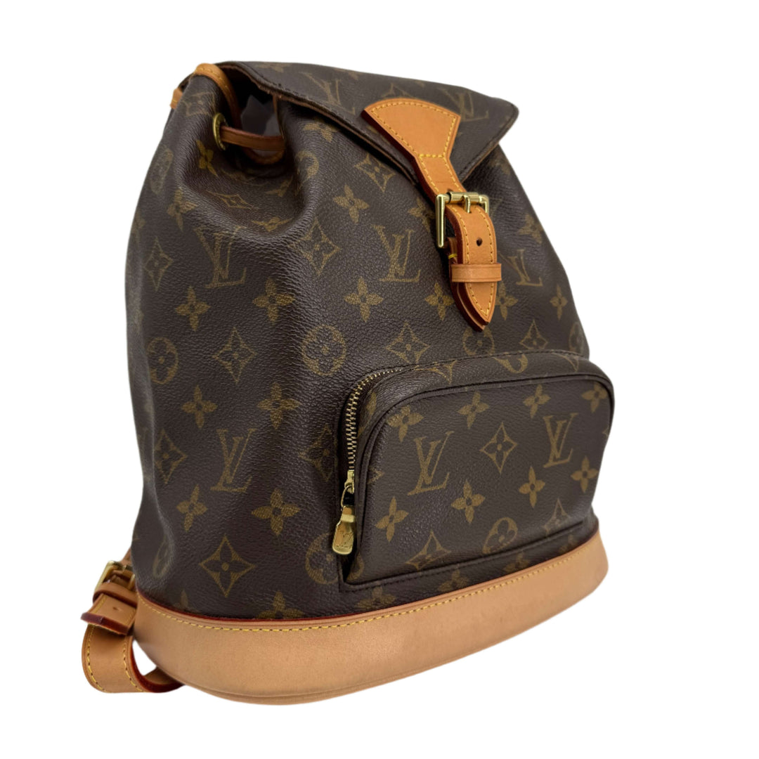 Louis Vuitton Montsouris Backpack MM in Monogram Canvas with vachetta leather trim and adjustable straps.