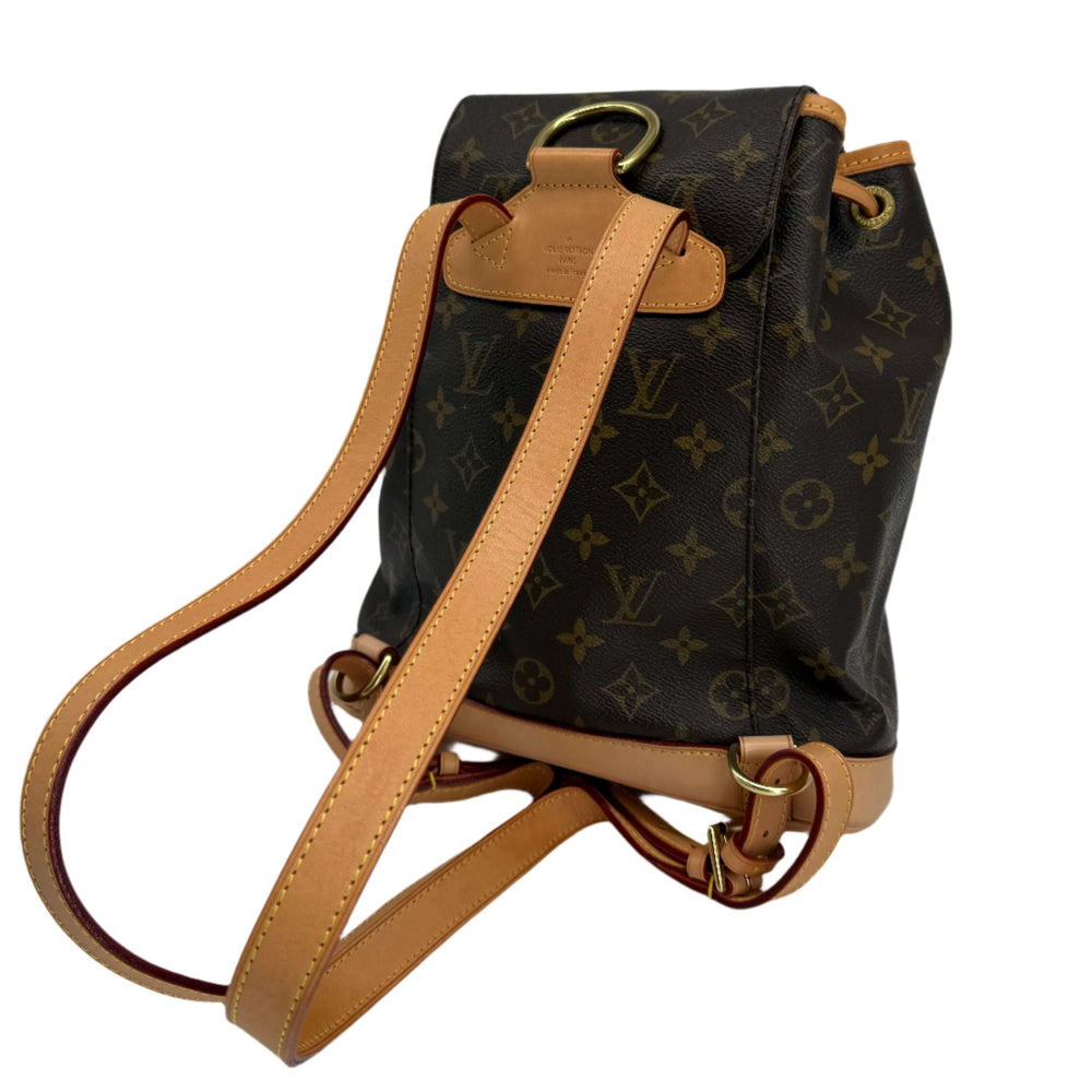 Louis Vuitton Montsouris Backpack MM in Monogram Canvas with vachetta leather trim, showcasing adjustable shoulder straps.