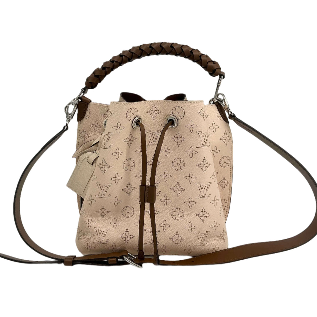 Louis Vuitton Mahina Muria in Crème with braided handle and spacious interior, authentic pre-owned designer handbag.