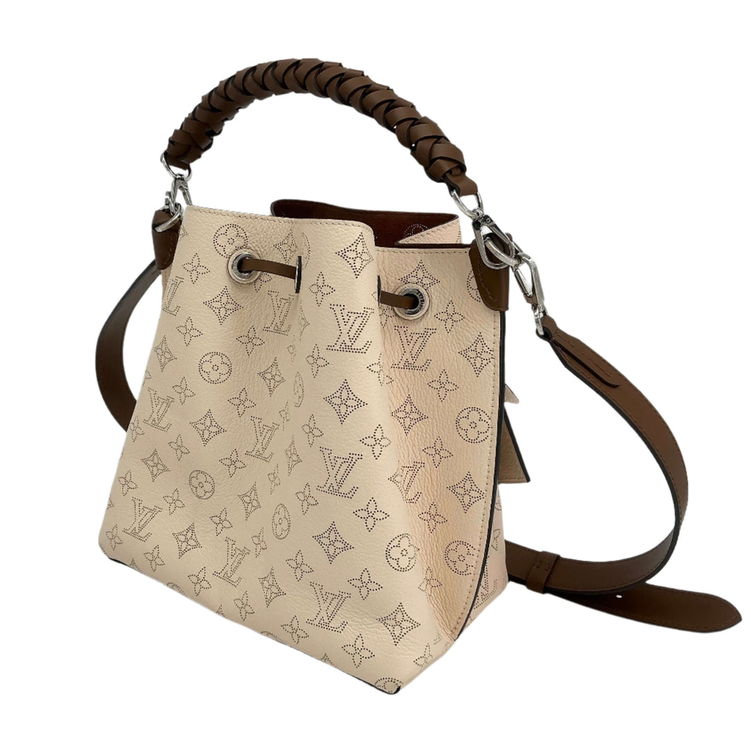 Louis Vuitton Mahina Muria in Crème, authentic pre-owned handbag with perforated leather and braided handle.