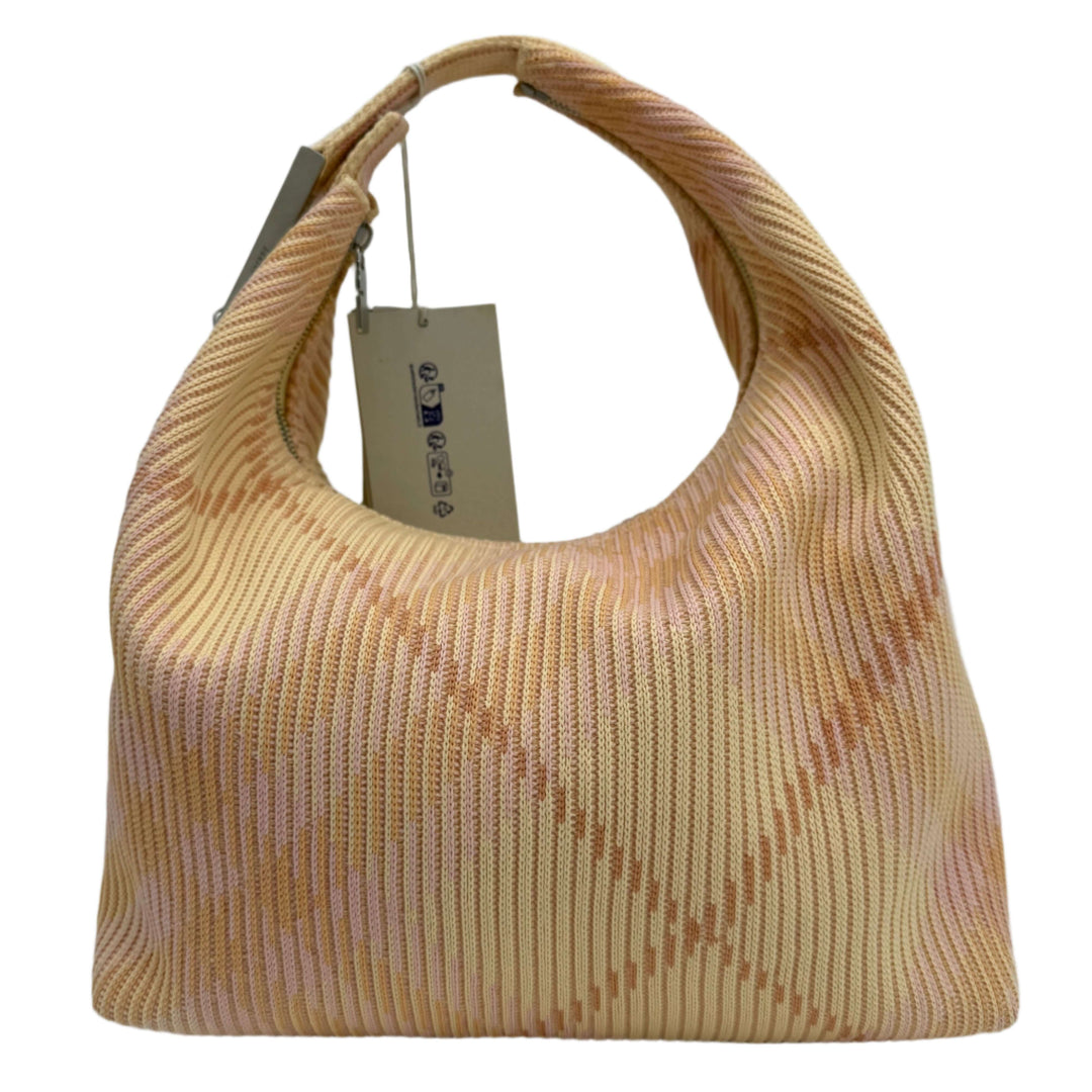 Burberry Canvas Peg Medium Duffle Bag in Sherbert with pink and beige check pattern and spacious design.