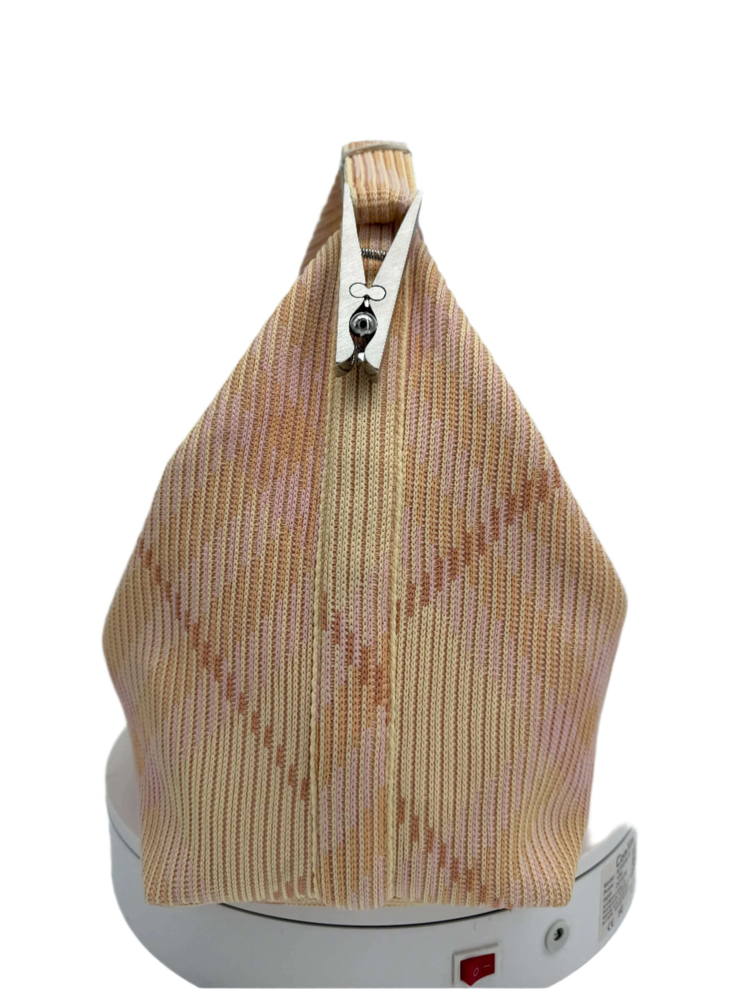 Back view of Burberry Canvas Peg Medium Duffle Bag in Sherbert with pink check pattern and zip closure.