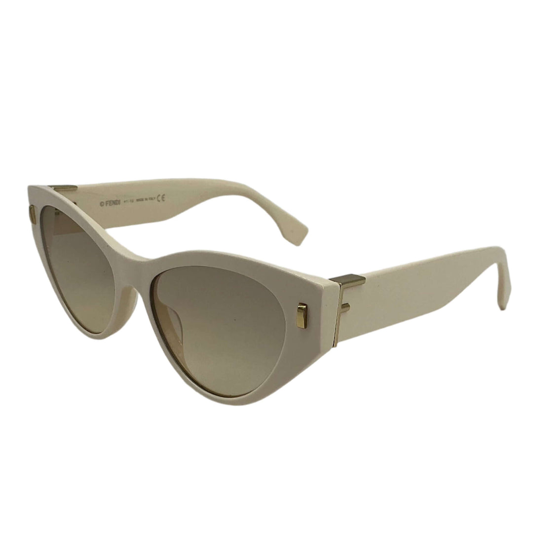 Fendi Eyewear Cat-Eye Frame Sunglasses in cream color with gradient lenses and iconic FF logo.