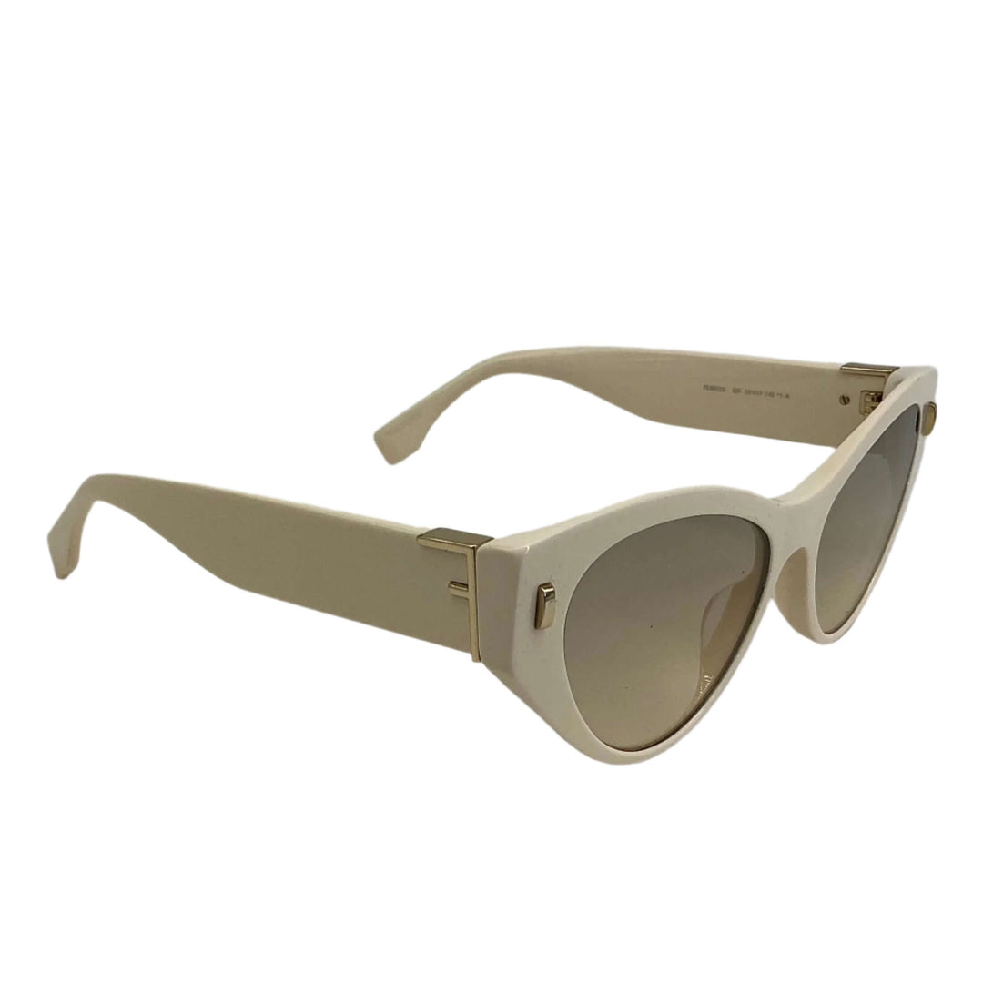 Fendi Eyewear Cat-Eye Frame Sunglasses in cream color with acetate frames and iconic FF logo.