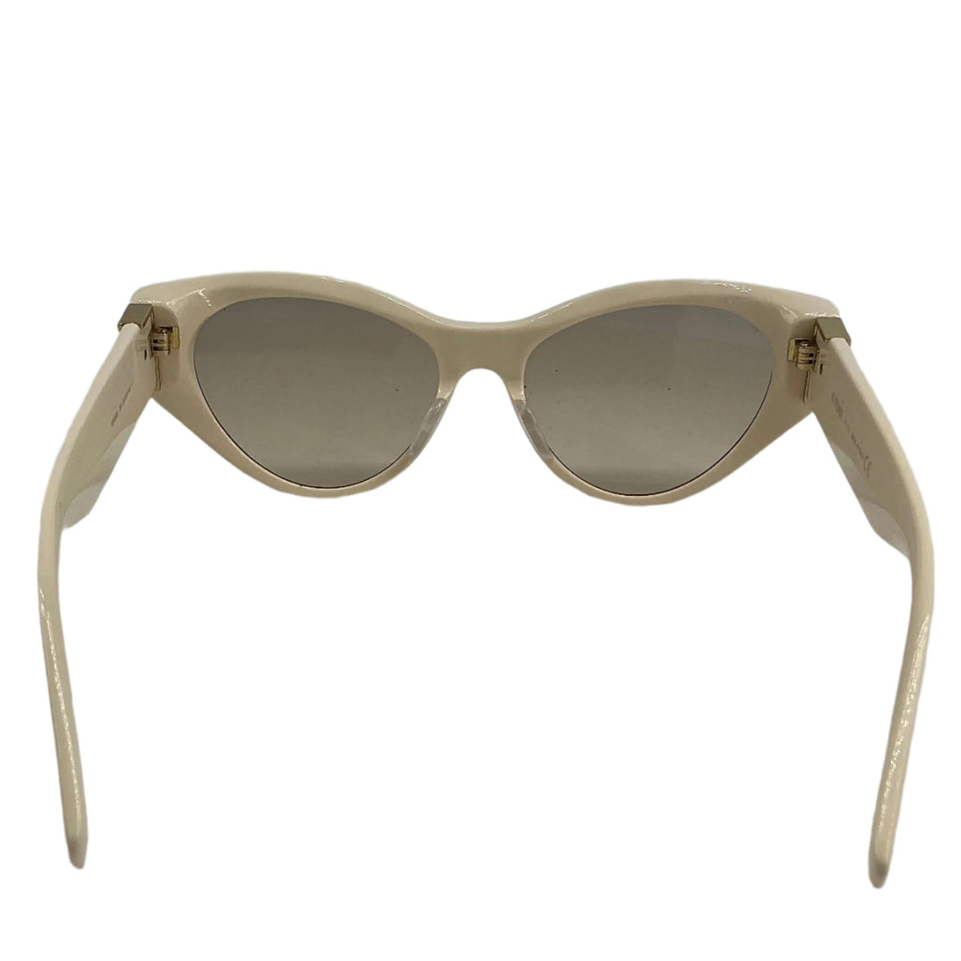 Fendi Eyewear cat-eye frame sunglasses with light-colored acetate and gradient lenses, showcasing sophisticated Italian design.