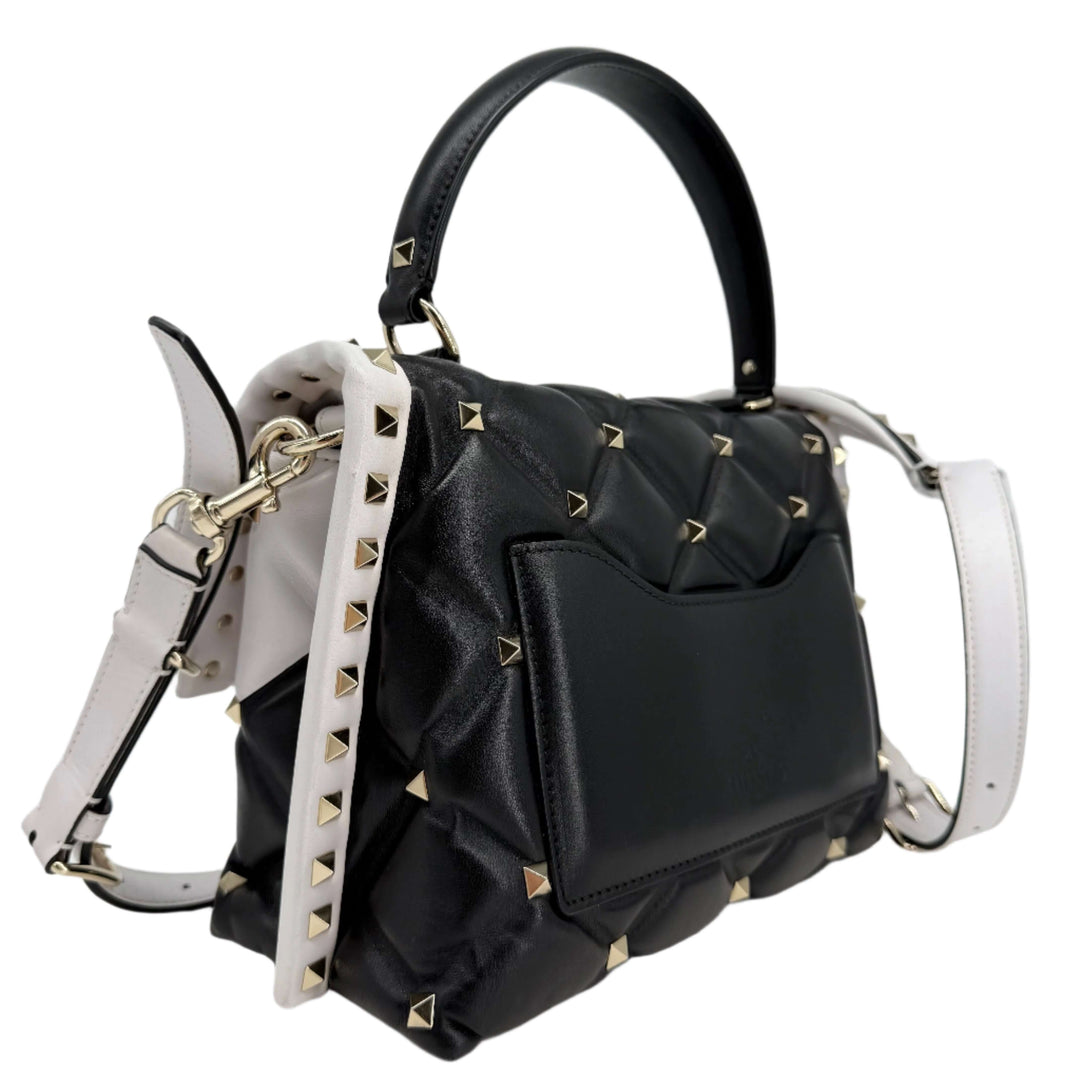 Valentino Garavani Nappa Medium Candystud Top Handle Bag, black and white, featuring diamond-quilted design and signature studs.