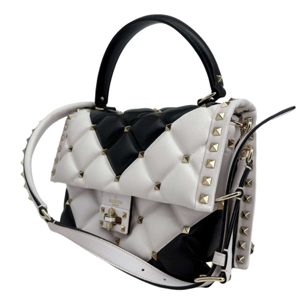 Valentino Garavani Nappa Medium Candystud Top Handle Bag in black and white with gold studs, pre-owned condition.