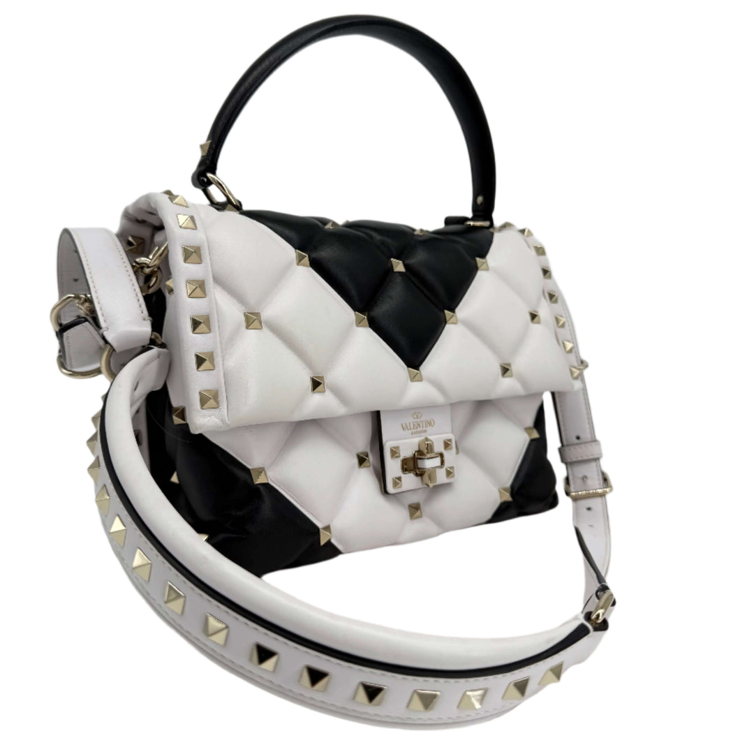 Authentic Valentino Garavani Nappa Medium Candystud Top Handle Bag in black and white with quilted design and studs.