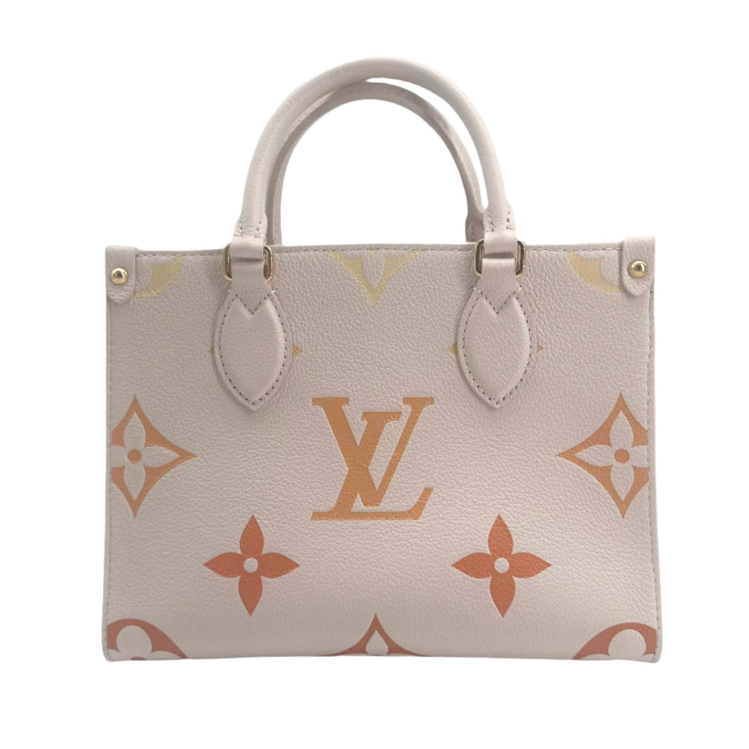 Louis Vuitton Empreinte Monogram Giant By The Pool Onthego PM handbag in cream with iconic LV monogram design.