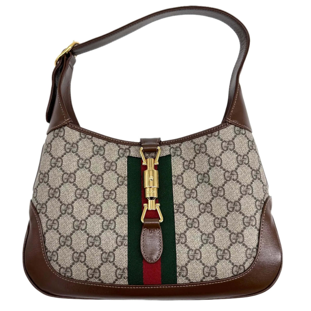 Gucci GG Supreme Monogram Small Jackie 1961 Hobo Bag in Beige Ebony with Brown Leather Trim and Gold Hardware.